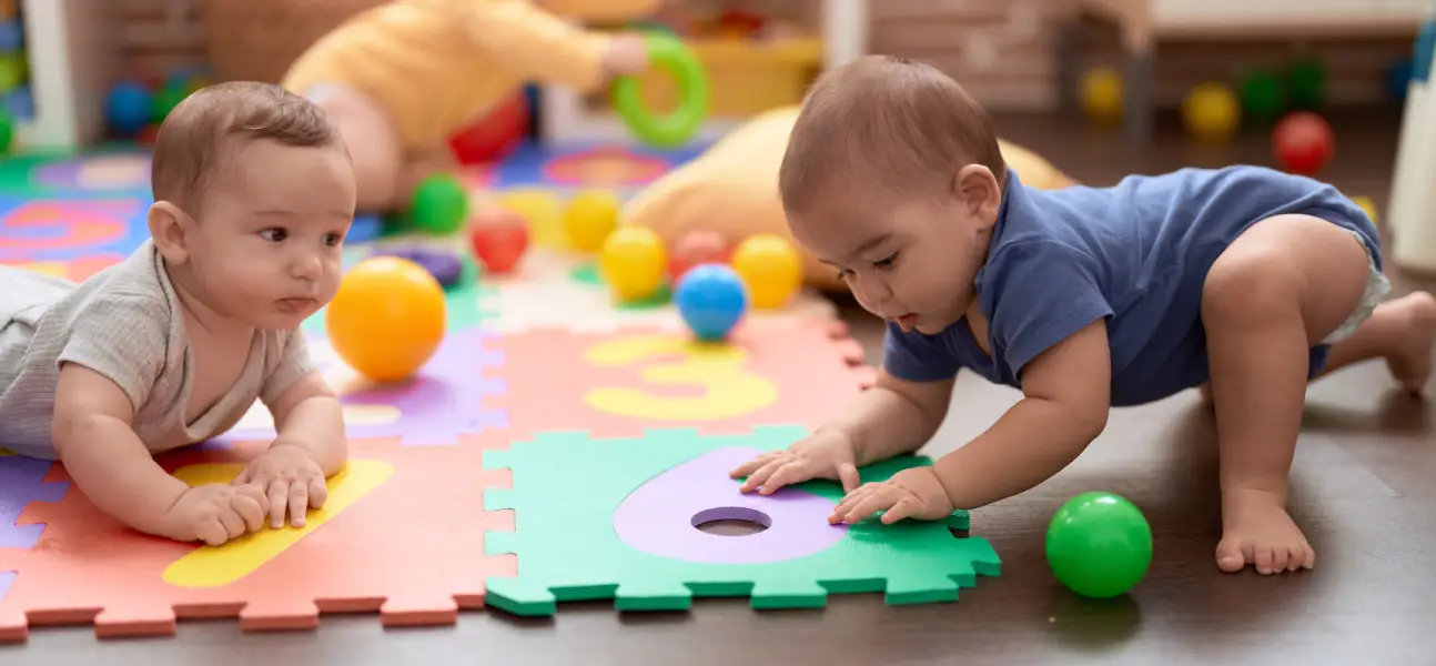 two toddlers playing