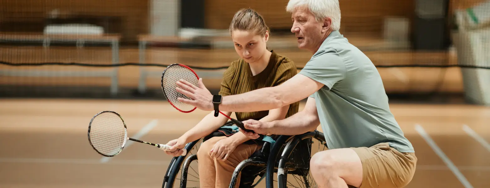 disabled woman learning badmington