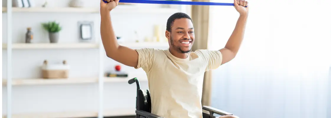 man in wheelchair exercising