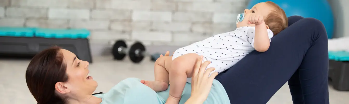 mum doing yoga with baby